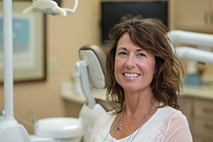 Smiling woman in dental office